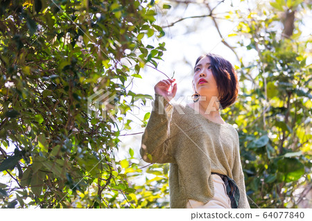 Outdoor woman portrait Outdoor woman portrait 64077840