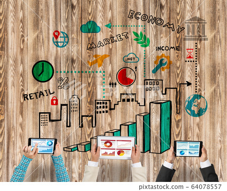 Top view of businesspeople sitting at table and using gadgets Top view of businesspeople sitting at table and using gadgets 64078557