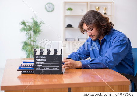Movie director working in the studio Movie director working in the studio 64078562