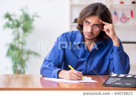 Movie director working in the studio Movie director working in the studio 64078625