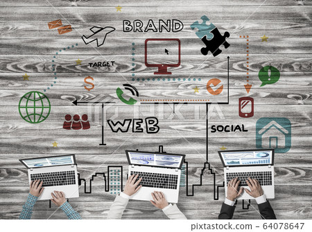 Top view of businesspeople sitting at table and using gadgets Top view of businesspeople sitting at table and using gadgets 64078647