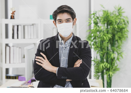 Businessman wearing surgical mask. Businessman wearing surgical mask. 64078684