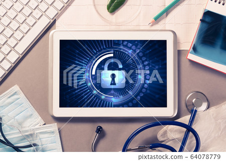 Web security and technology concept with tablet pc on table Web security and technology concept with tablet pc on table 64078779