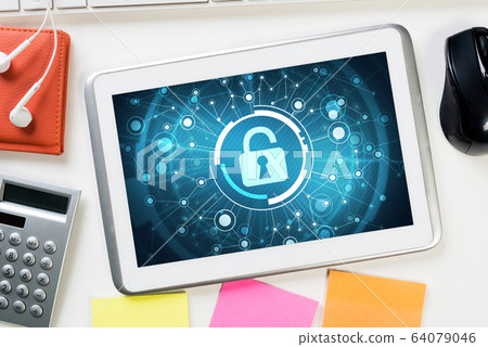 Web security and technology concept with tablet pc on wooden table Web security and technology concept with tablet pc on wooden table 64079046
