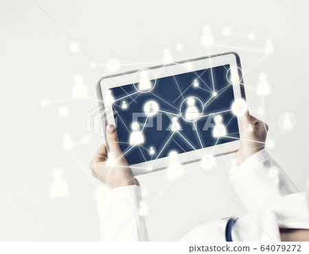 Close of female doctor hands working with tablet pc computer Close of female doctor hands working with tablet pc computer 64079272