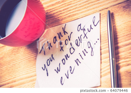 Romantic message written on napkin Romantic message written on napkin 64079446