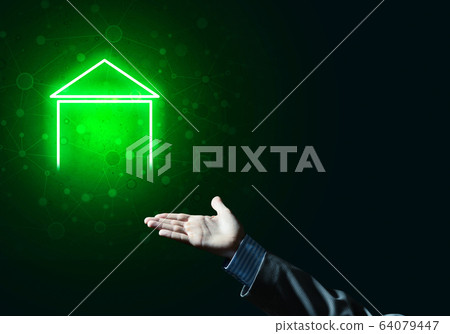 Conceptual image with hand pointing at house or main page icon on dark background Conceptual image with hand pointing at house or main page icon on dark background 64079447