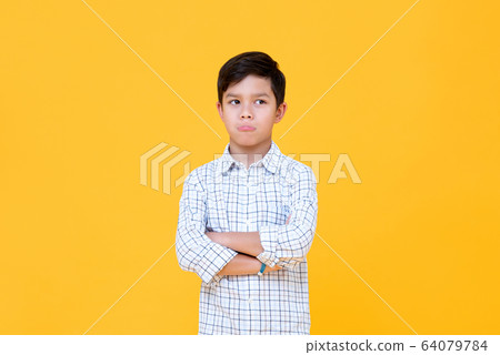 Sulky bored boy pouting mouth  64079784