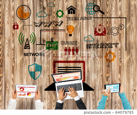 Top view of businesspeople sitting at table and using gadgets 64079785