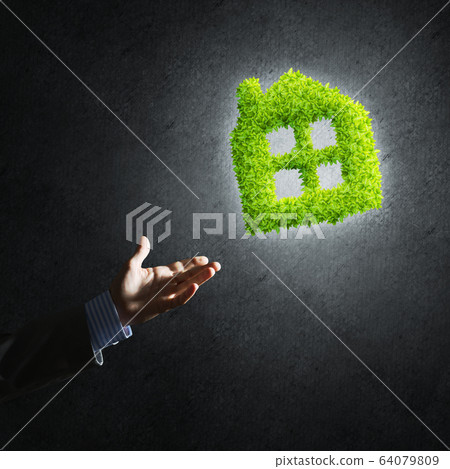 Concept of eco architecture presented by green house on dark background Concept of eco architecture presented by green house on dark background 64079809