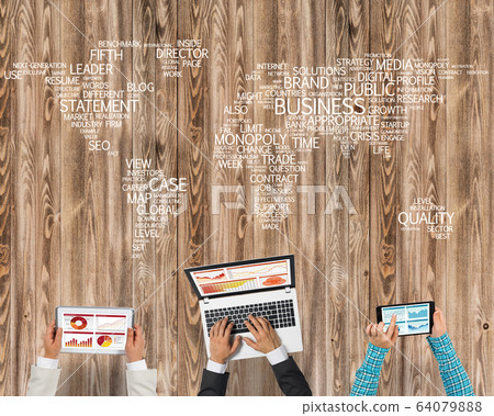 Top view of businesspeople sitting at table and using gadgets Top view of businesspeople sitting at table and using gadgets 64079888