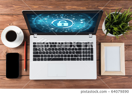 Web security and technology concept with laptop on wooden table 64079890