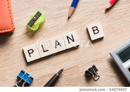 Conceptual business keywords on table with elements of game making crossword Conceptual business keywords on table with elements of game making crossword 64079897