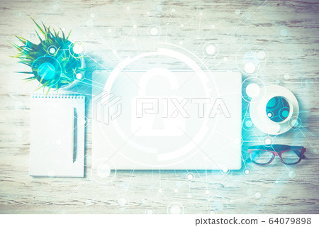 Business workplace with laptop coffee cup and security concept o Business workplace with laptop coffee cup and security concept o 64079898