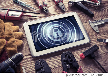 Web security and technology concept with tablet pc on wooden tab Web security and technology concept with tablet pc on wooden tab 64080042