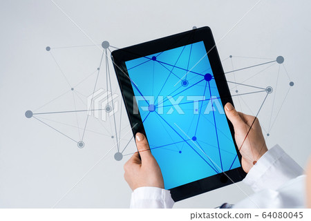 Close of female doctor hands working with tablet pc computer 64080045