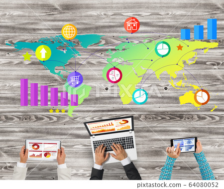 Top view of businesspeople sitting at table and using gadgets Top view of businesspeople sitting at table and using gadgets 64080052