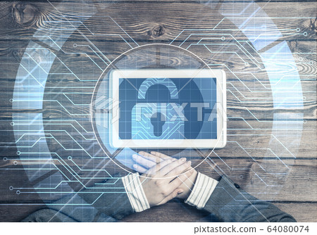 Concept of computer access with media lock icon on tablet screen 64080074