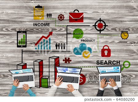 Top view of businesspeople sitting at table and using gadgets Top view of businesspeople sitting at table and using gadgets 64080200