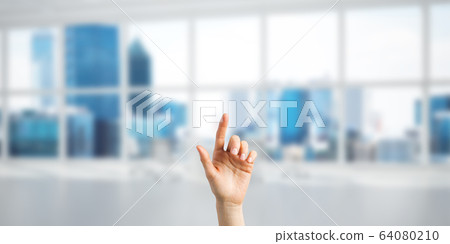 Choosing gesture of person in elegant modern interior in sunshine light Choosing gesture of person in elegant modern interior in sunshine light 64080210