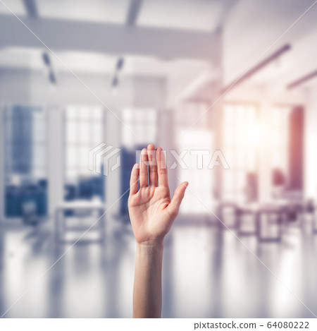 Choosing gesture of person in elegant modern interior in sunshin Choosing gesture of person in elegant modern interior in sunshin 64080222
