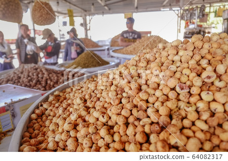 Heap of organic dried figs in local market 64082317