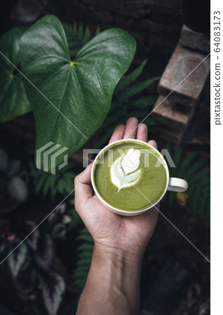 Matcha Latte at home,Coffee in a glass 64083173