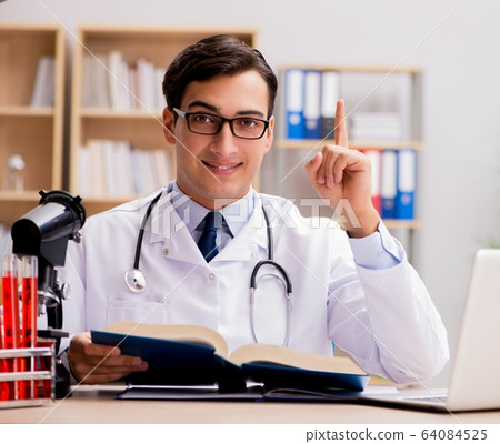 Young doctor studying medical education 64084525