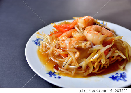 A lot of shrimp with ankake fried noodles A lot of shrimp with ankake fried noodles 64085331