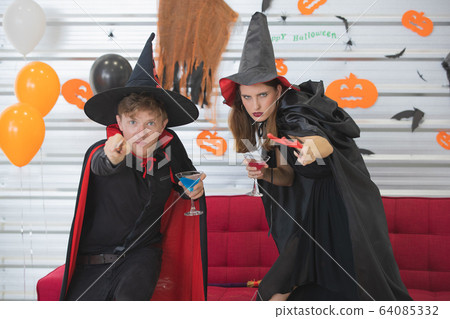 Couple are challenging enemies in front of them.. Couple are challenging enemies in front of them.. 64085332