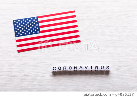 Covid-19, pandemic, quarantine and virus concept - coronavirus with american usa flag on white background. 64086137