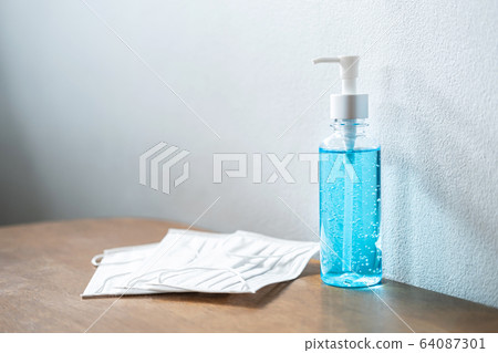 Image of medical surgical masks and alcohol Image of medical surgical masks and alcohol 64087301