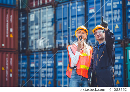 logistic worker man and woman working team with 64088262