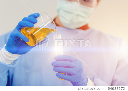 Scientist dressing blue disposable scrub suits for safety and protection 64088272