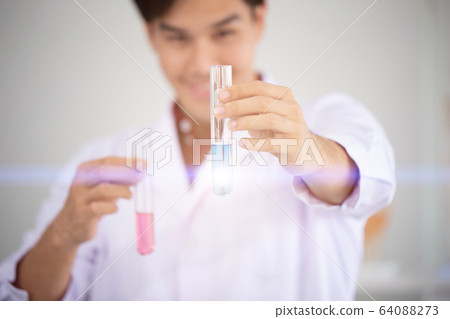 Scientist happy to successful discover new drug formula by choice select good chemical 64088273