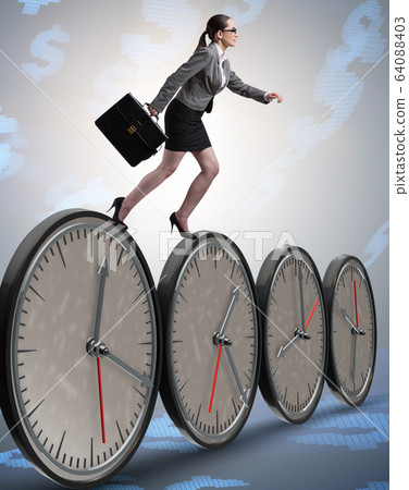 Businesswoman in time management concept Businesswoman in time management concept 64088403