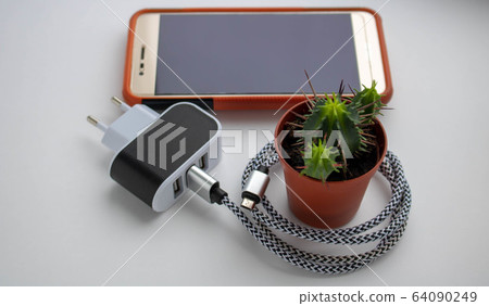 Electric socket with connected phone charger.technology mobile Electric socket with connected phone charger.technology mobile 64090249