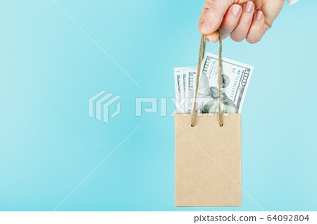 A small paper bag for financial aid and support A small paper bag for financial aid and support 64092804