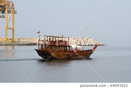 Dhow, traditional sailing and fishing boat Dhow, traditional sailing and fishing boat 64093922