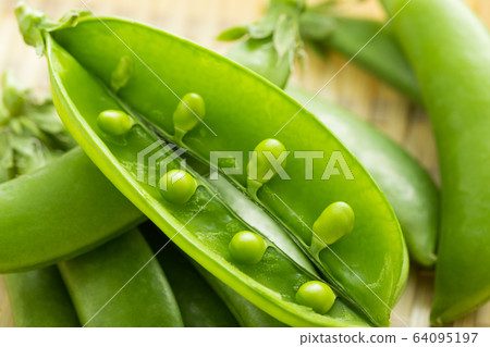Image photo of snap peas of spring vegetables Image photo of snap peas of spring vegetables 64095197
