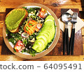 Fresh avocado salmon salad 64095491