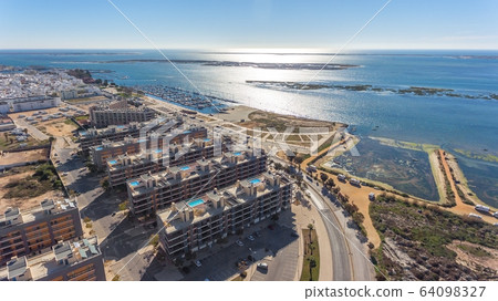 Aerial view of Olhao, Algarve, Portugal. Aerial view of Olhao, Algarve, Portugal. 64098327