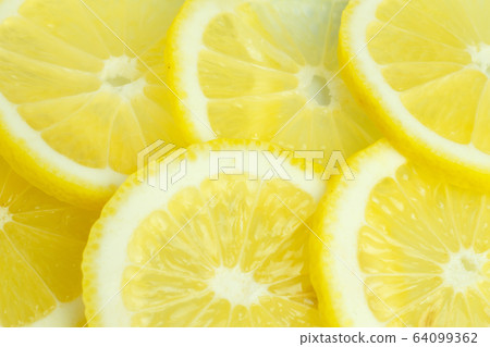 Background from bright juicy sliced lemon slices. Background from bright juicy sliced lemon slices. 64099362