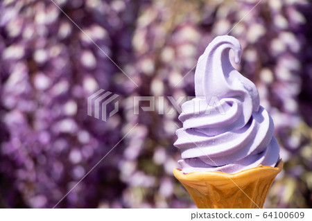 Violet ice cream with blurred fuji wisteria flower Violet ice cream with blurred fuji wisteria flower 64100609