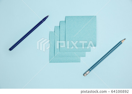 Sticker paper. Monochrome stylish composition in blue color. Top view, flat lay. Sticker paper. Monochrome stylish composition in blue color. Top view, flat lay. 64100892