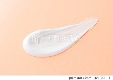 Latex closeup pale orange background 64100901