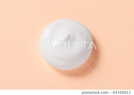 乳膠特寫鏡頭淡橙色背景 乳膠特寫鏡頭淡橙色背景 64100913