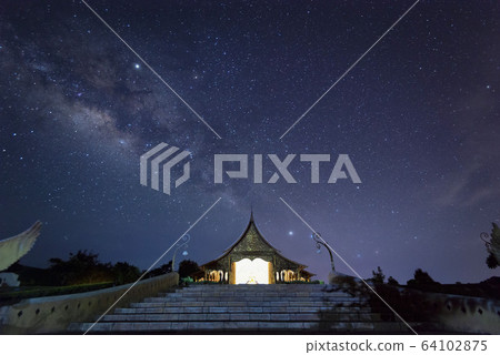 Night View of Wat Sirindhorn Wararam Phu Prao, Glow in the Dark Temple under the Milky Way, Ubon Ratchathani, Thailand Night View of Wat Sirindhorn Wararam Phu Prao, Glow in the Dark Temple under the Milky Way, Ubon Ratchathani, Thailand 64102875