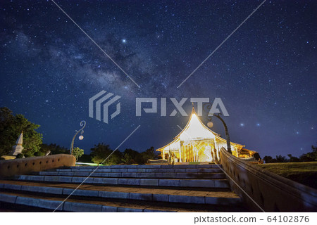 Night View of Wat Sirindhorn Wararam Phu Prao, Glow in the Dark Temple under the Milky Way, Ubon Ratchathani, Thailand 64102876