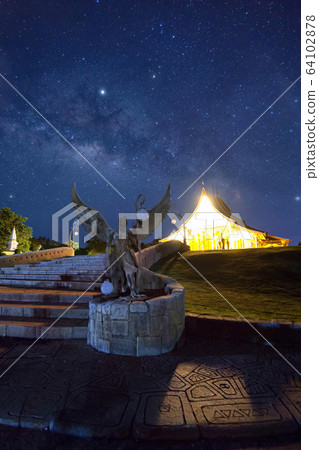 Night View of Wat Sirindhorn Wararam Phu Prao, Glow in the Dark Temple under the Milky Way, Ubon Ratchathani, Thailand 64102878